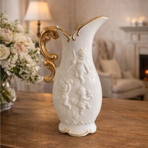 VINTAGE, HAND PAINTED WHITE PITCHER WITH GOLD ACCENTS & CHERUBS/BABIES.  G12